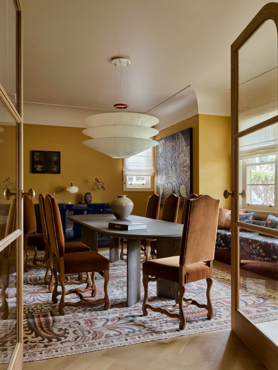 Formal dining room in mellow marigold