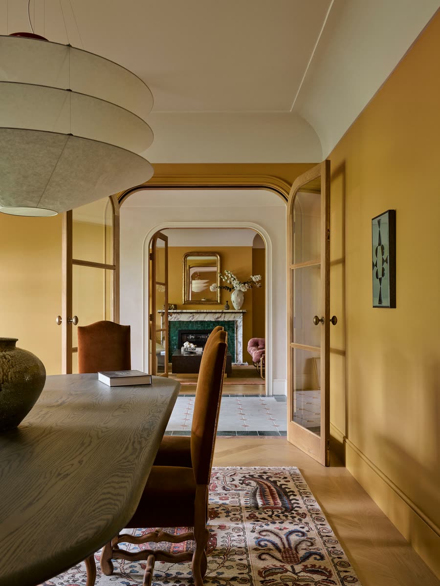 Dining and sitting rooms in deep marigold